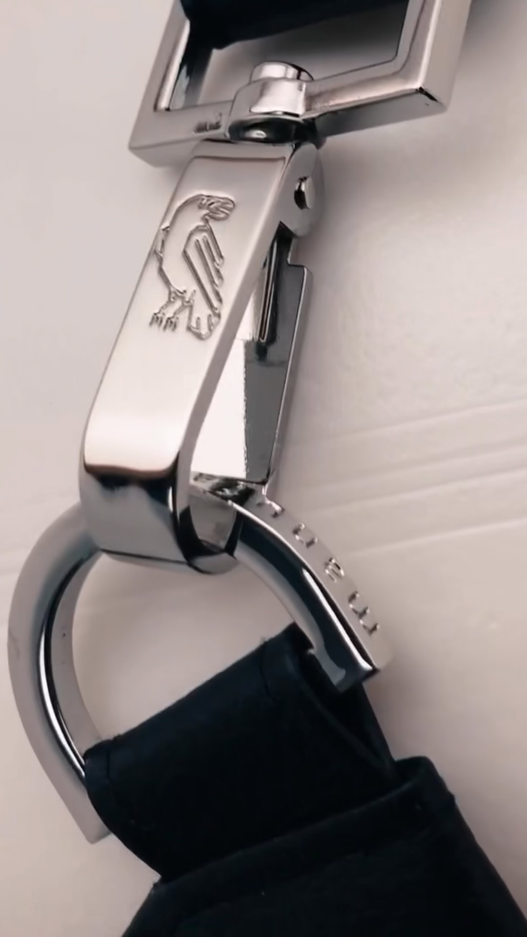 Manufabo handmade snake belt bag showcased against elegant background, embodying White Raven uniqueness theme