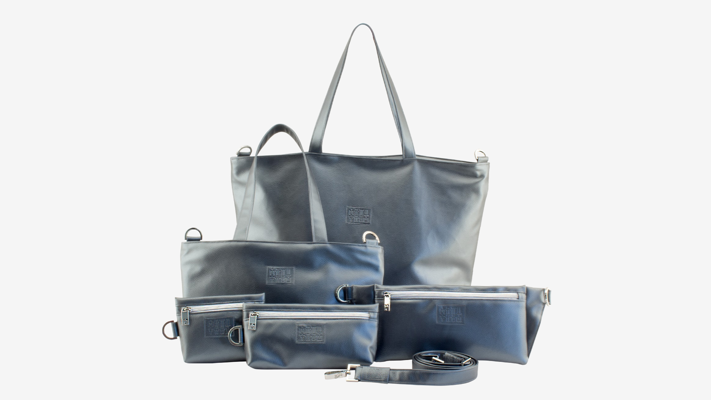 Selection of dark grey metallic handmade bags by Manufabo