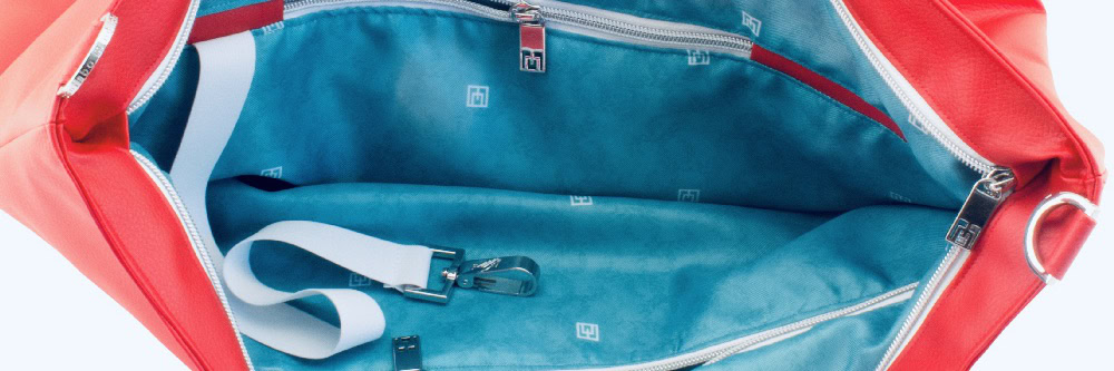 Tote bag inside view with manufabo turquoise inner lining in red