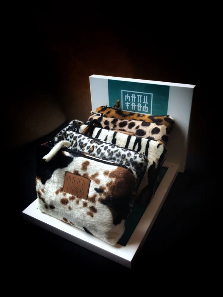 Post Manufabo Bags Cosmetic Animal Cow Lopard Tiger Cheetah Bag Product Display jpeg
