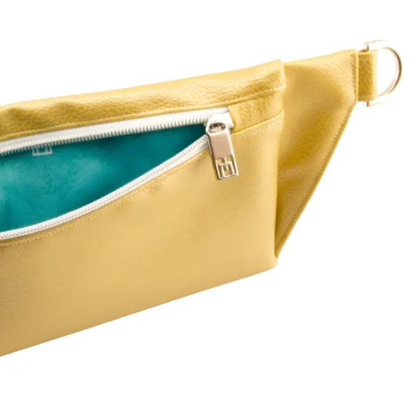belt bag backside with manufabo M lining in metallic gold jpg