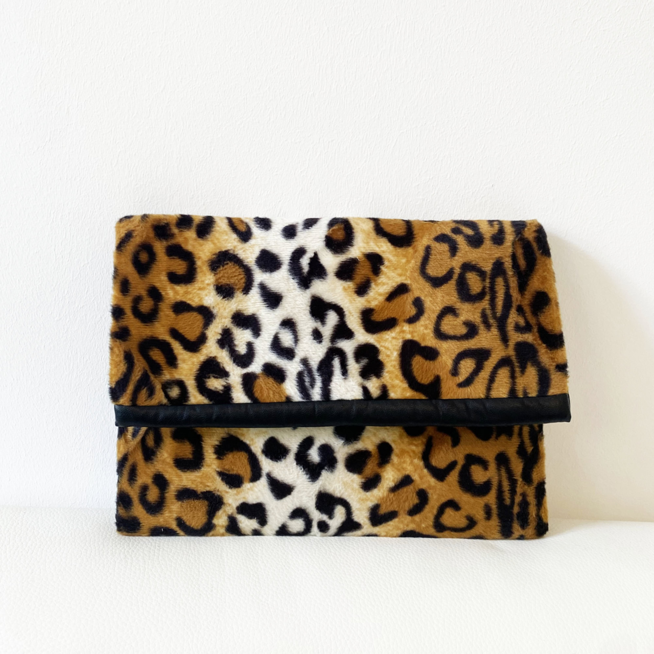 Manufabo Clutch Leo Print Faux Fur front