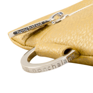 manufabo hardware details nonchalant zipper and d ring on bag in metallic gold