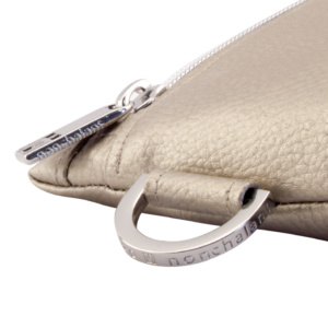 manufabo hardware details nonchalant zipper and d ring on bag in metallic sand brown