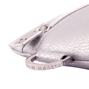 manufabo hardware details nonchalant zipper and d ring on bag in metallic silver