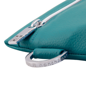 manufabo hardware details nonchalant zipper and d ring on bag in petrol turquoise