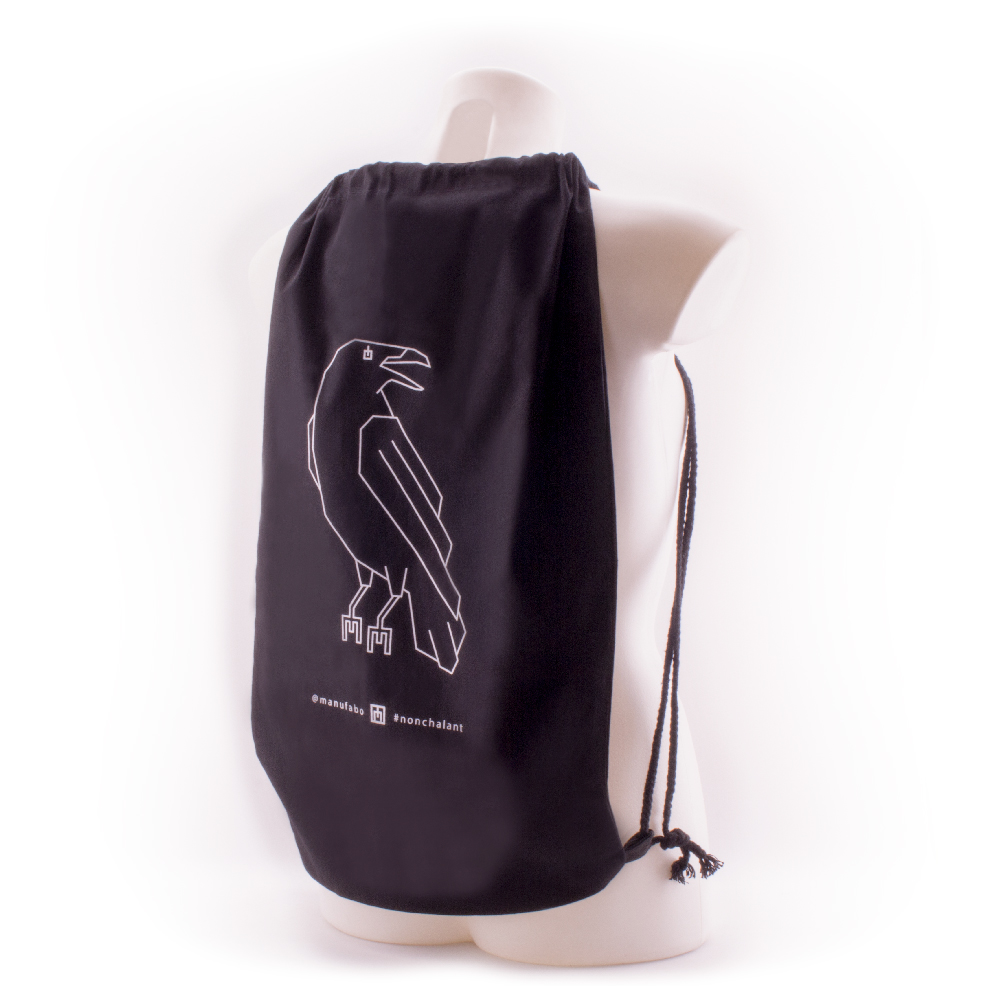 manufabo white raven on nonchalant black drawstring bag on white female bust mannequin